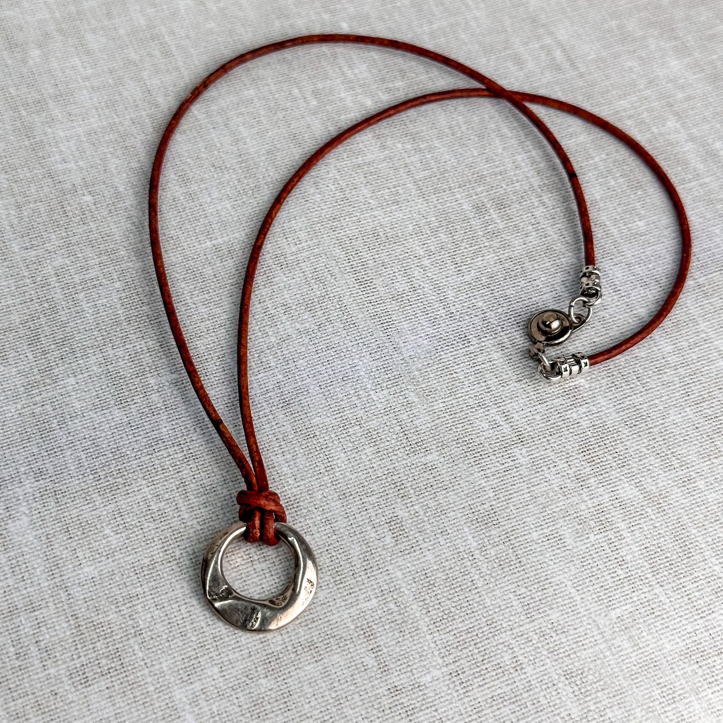 Leather Cord Pendant Necklace: Modern Hammered Silver Focal