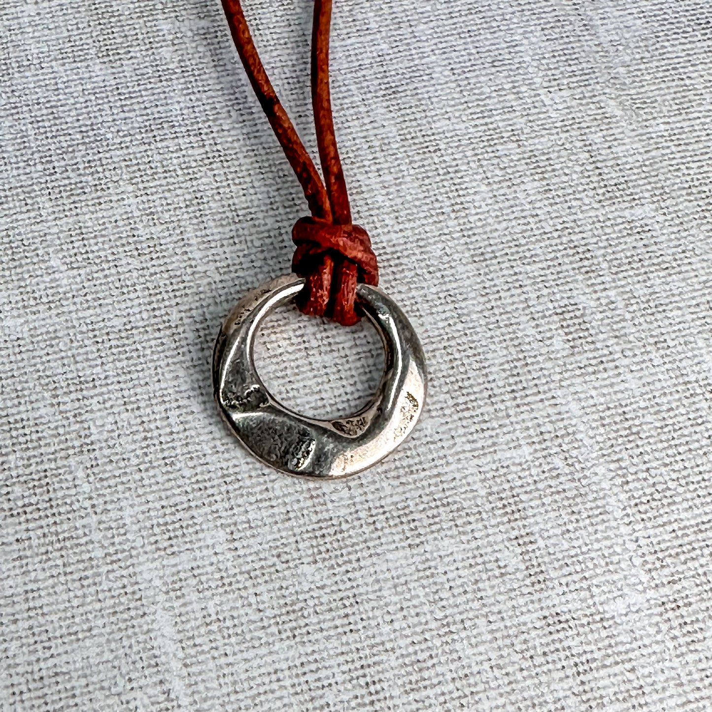 Leather Cord Pendant Necklace: Modern Hammered Silver Focal